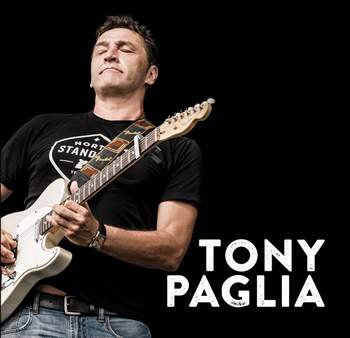 Tony Paglia playing guitar